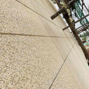 白城 黄金麻花岗岩荔枝面外墙干挂石材效果示例