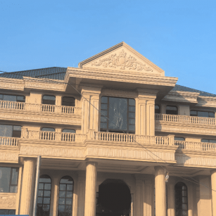 白城黄金麻别墅外墙干挂石材效果示例