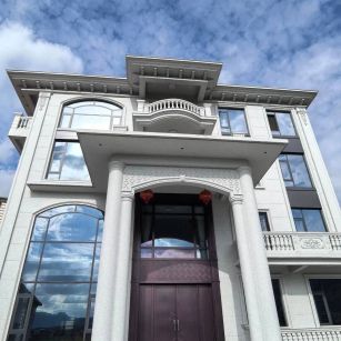 白城白麻别墅外墙干挂石材效果示例