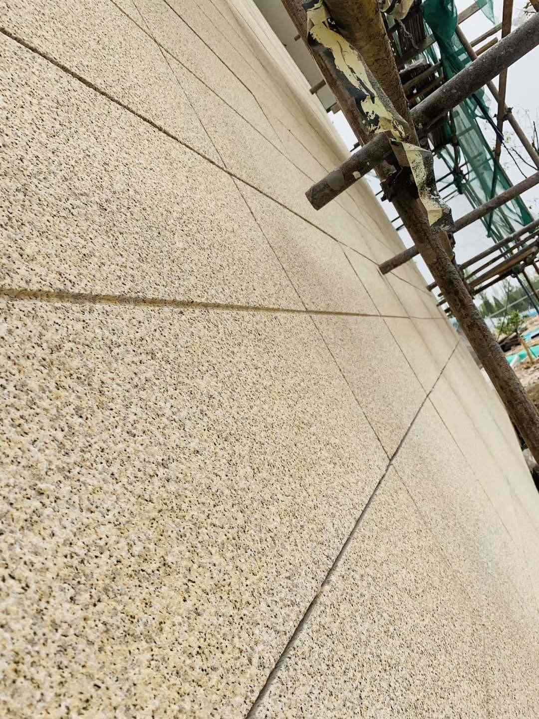 白城 黄金麻花岗岩荔枝面外墙干挂石材效果示例