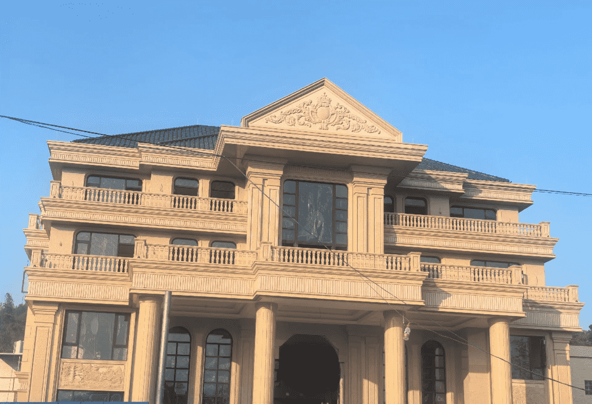 白城黄金麻别墅外墙干挂石材效果示例